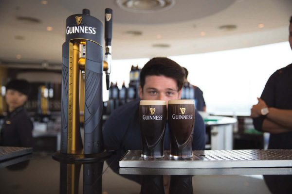 Checking the pour on the perfect pint of Guinness, Gravity Bar, Guinness Storehouse, St James Gate, Dublin 8